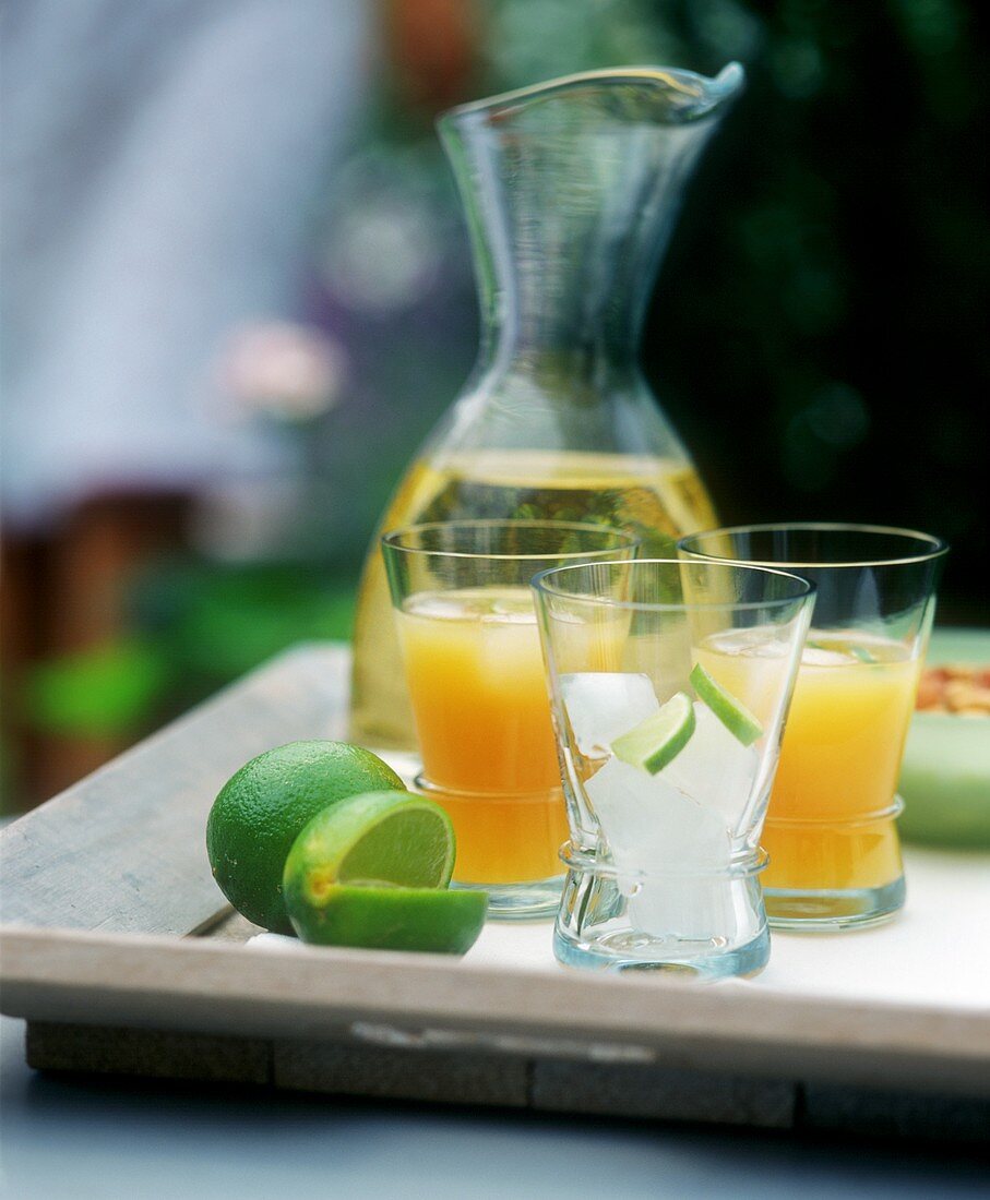Tray with glasses and carafe (apple juice and orange juice)