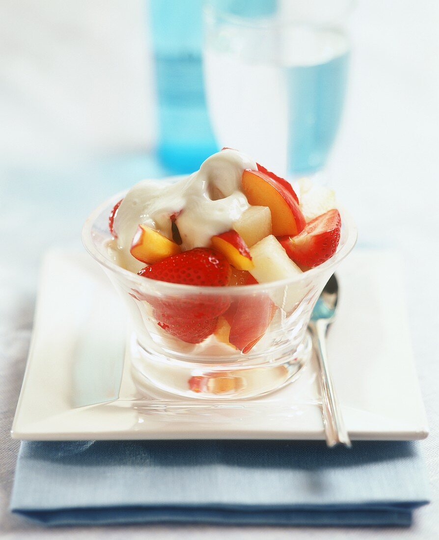 Mixed fruit salad with cream