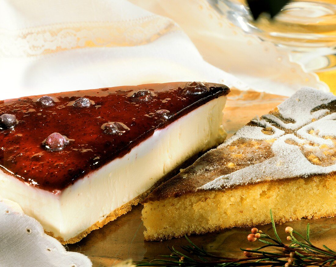 Cheesecake with berries & "Tarta de Santiago" (almond cake)