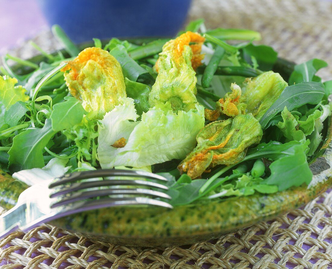 Mixed salad leaves with deep-fried courgette flowers