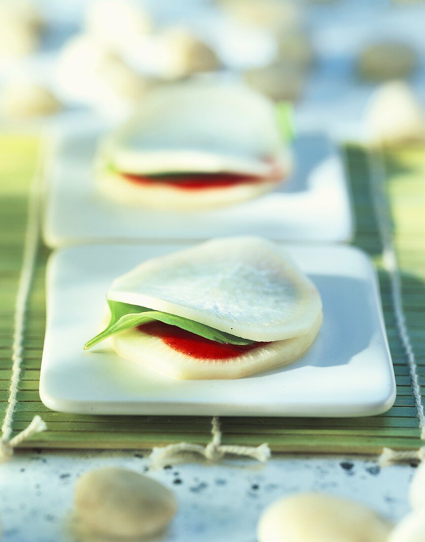 White radish sandwich with basil and tomato filling