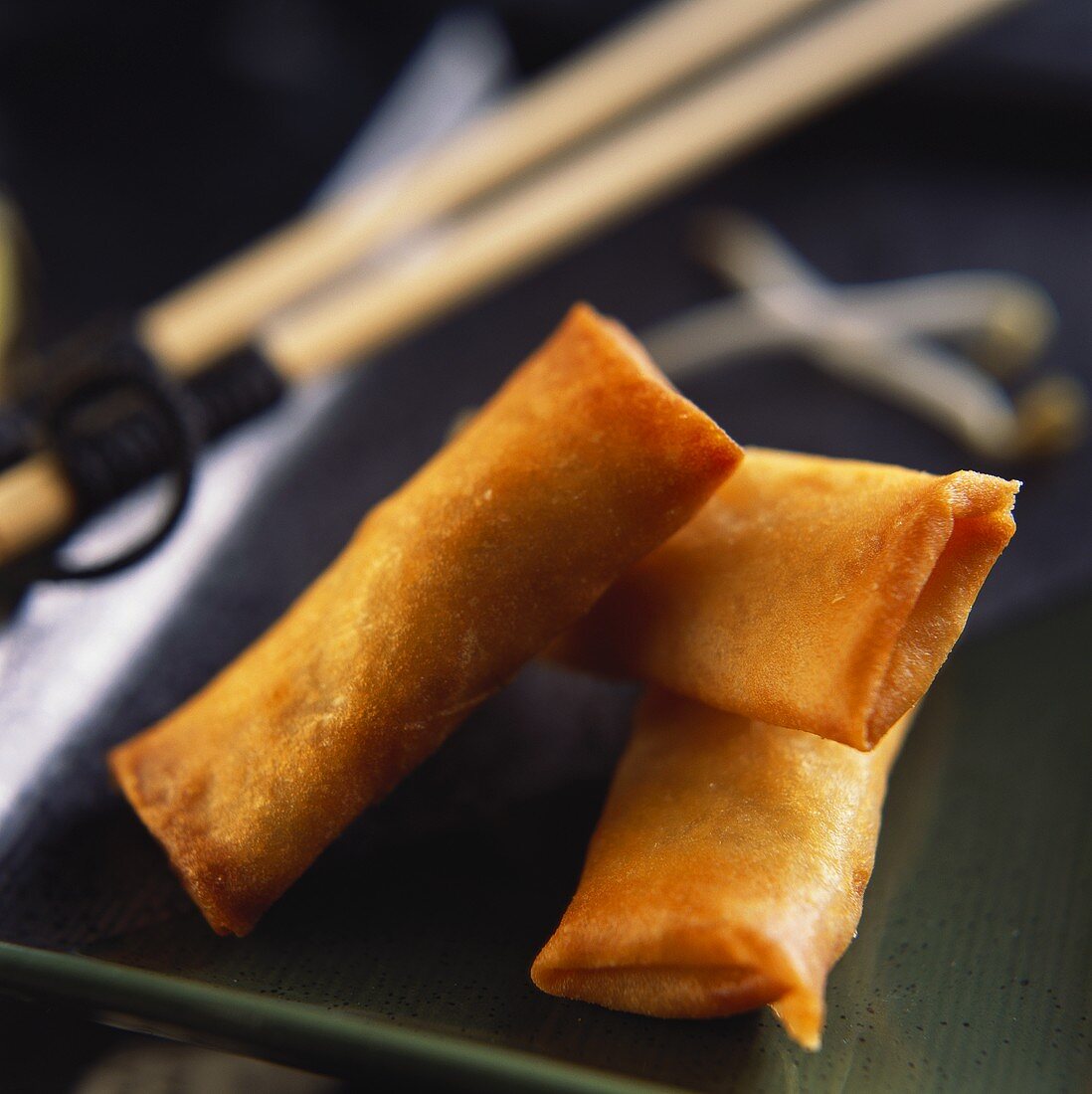 Three deep-fried spring rolls