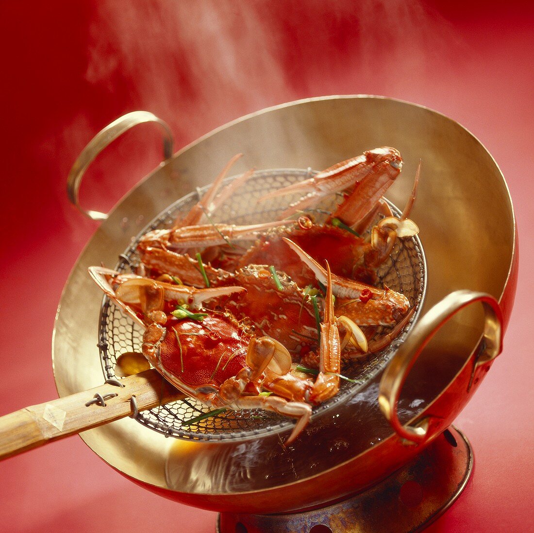 Cooking crabs in wok