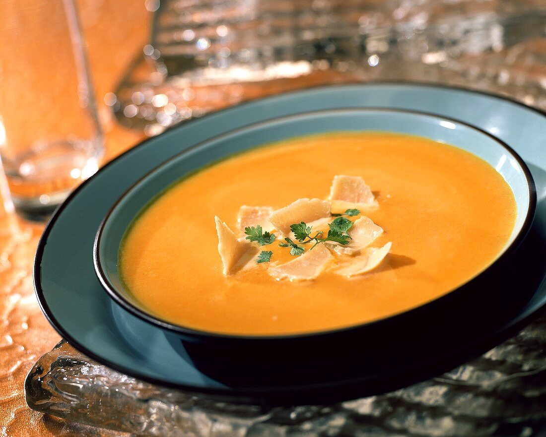 Creamed carrot soup with Parmesan shavings