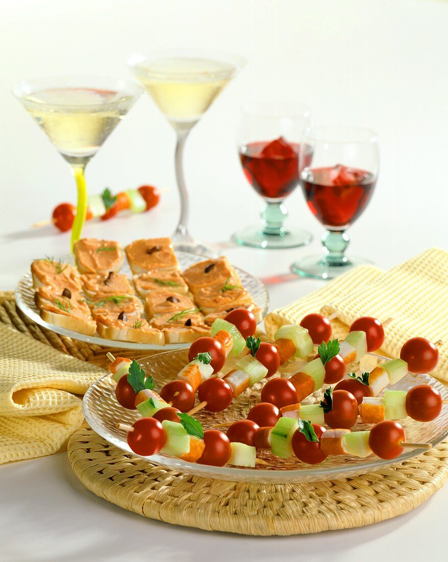 Tomato and surimi on sticks with cucumber and small toasts