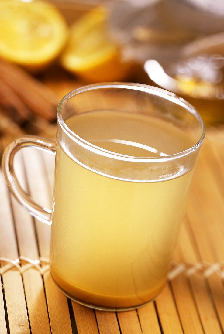 Hot ginger tea with honey (for colds and nausea)