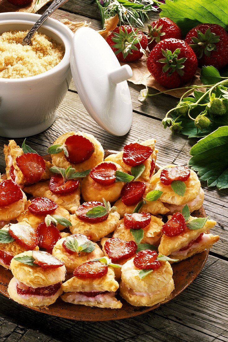 Strawberry tart in puff pastry with fresh mint