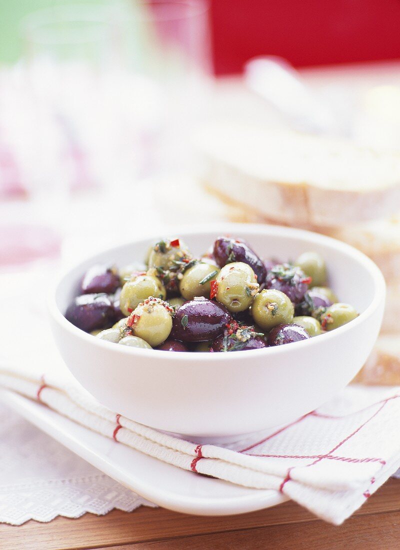 Pickled green and black olives with chili