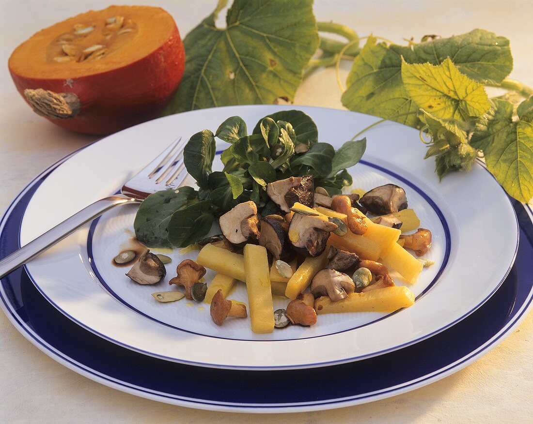 Pumpkin and mushrooms with fresh corn salad