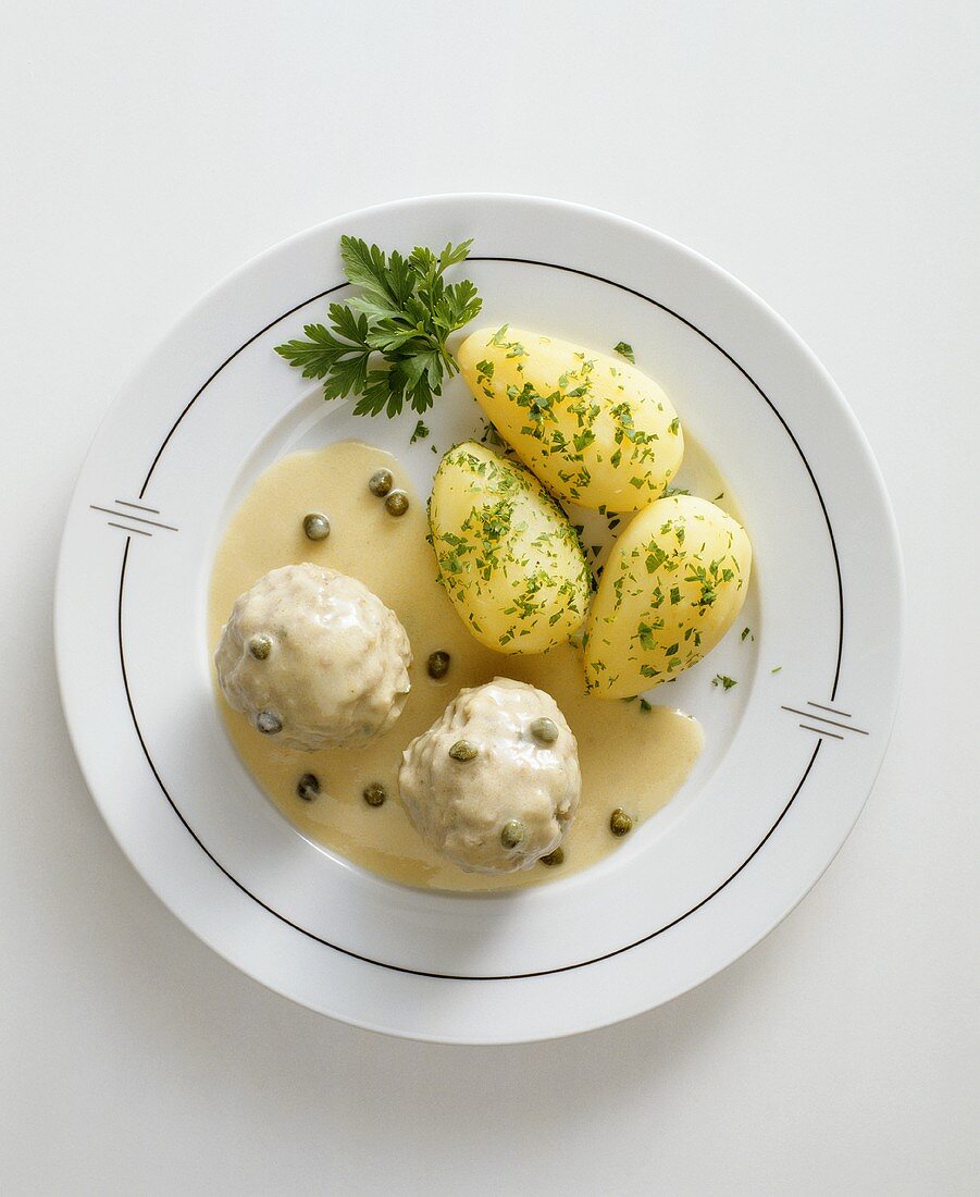 Königsberger meatballs with caper sauce and parsley potatoes