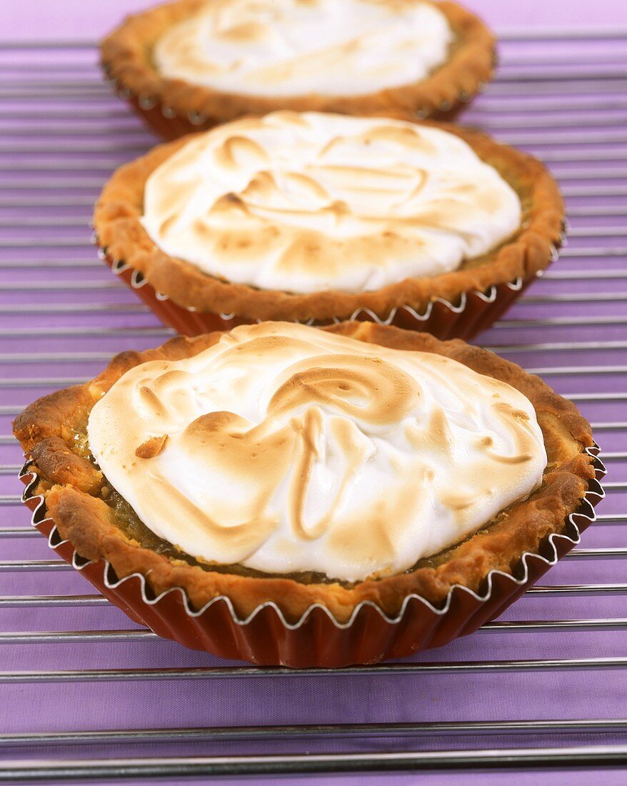 Lime and lemon tartlets with meringue topping