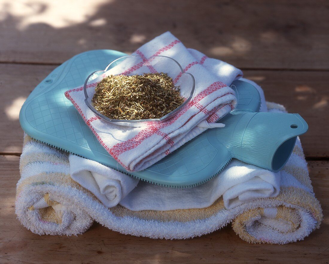 Dried herbs, towels and hot-water bottle