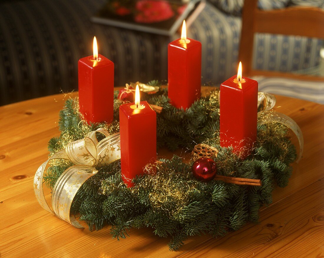 Advent wreath with four burning candles