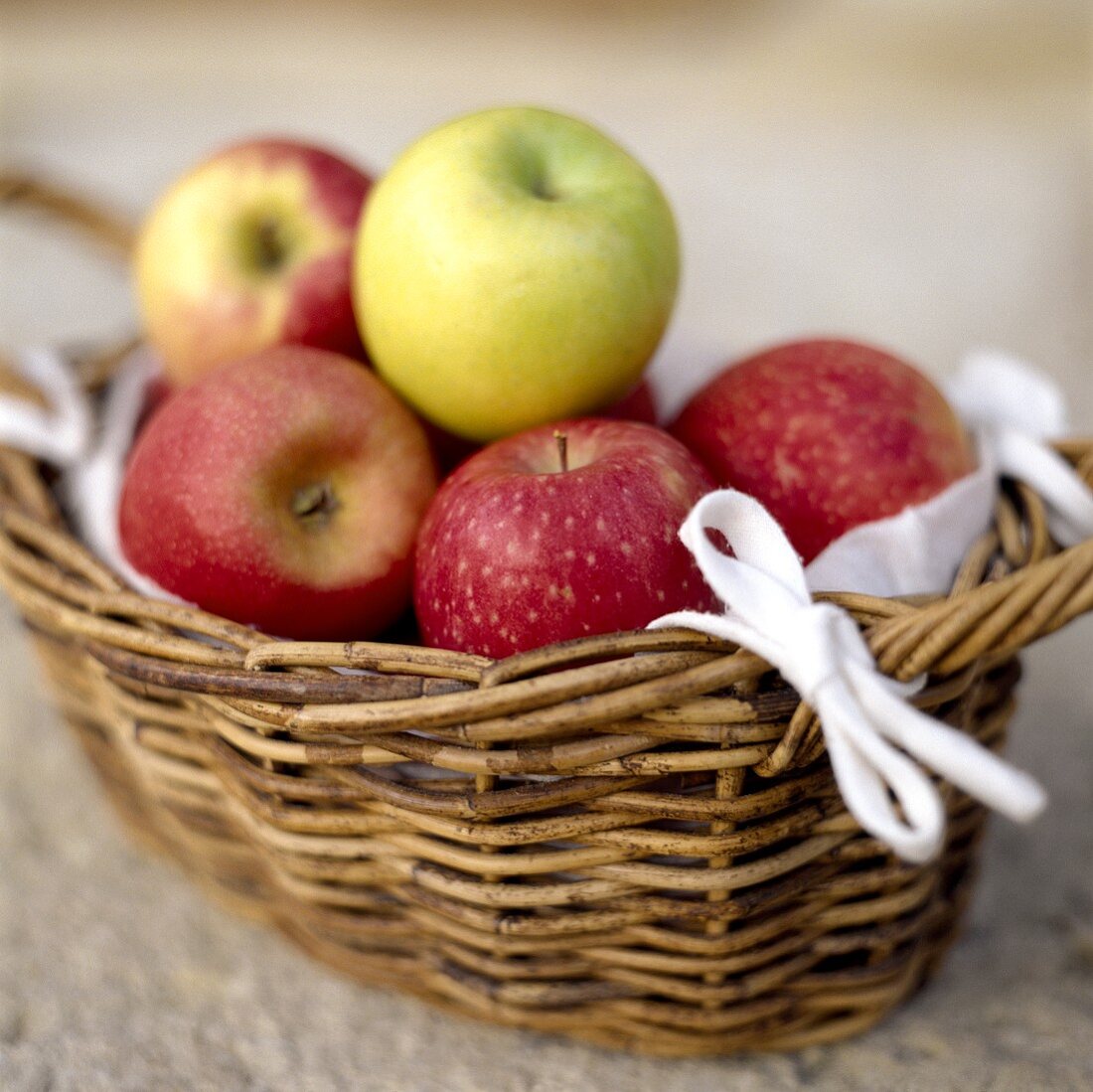 A basket of red and green apples