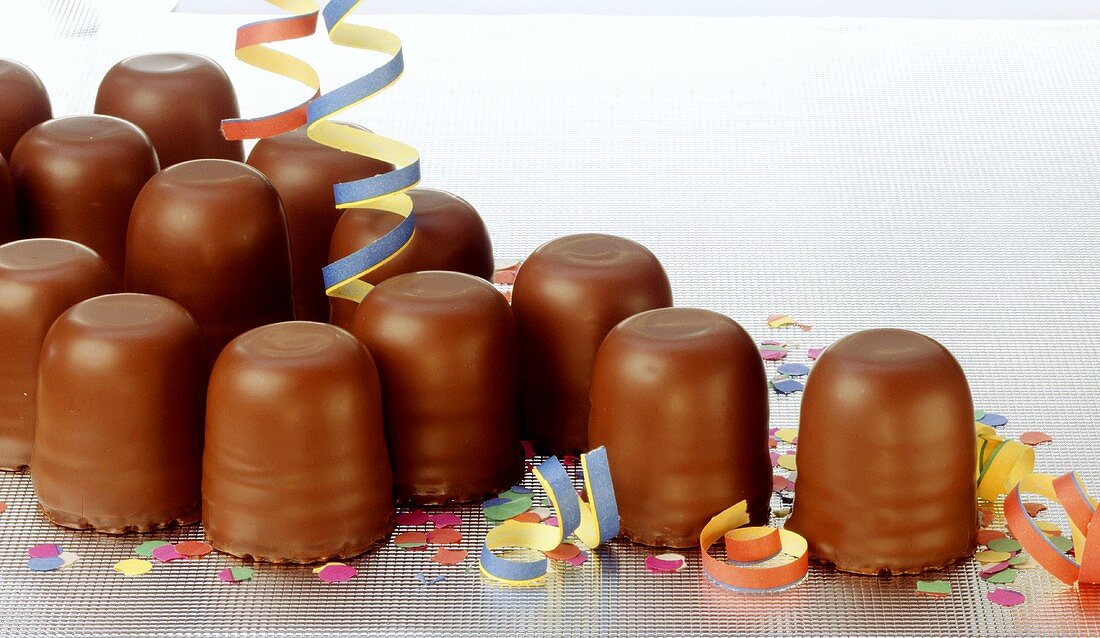 Chocolate marshmallows with party decorations