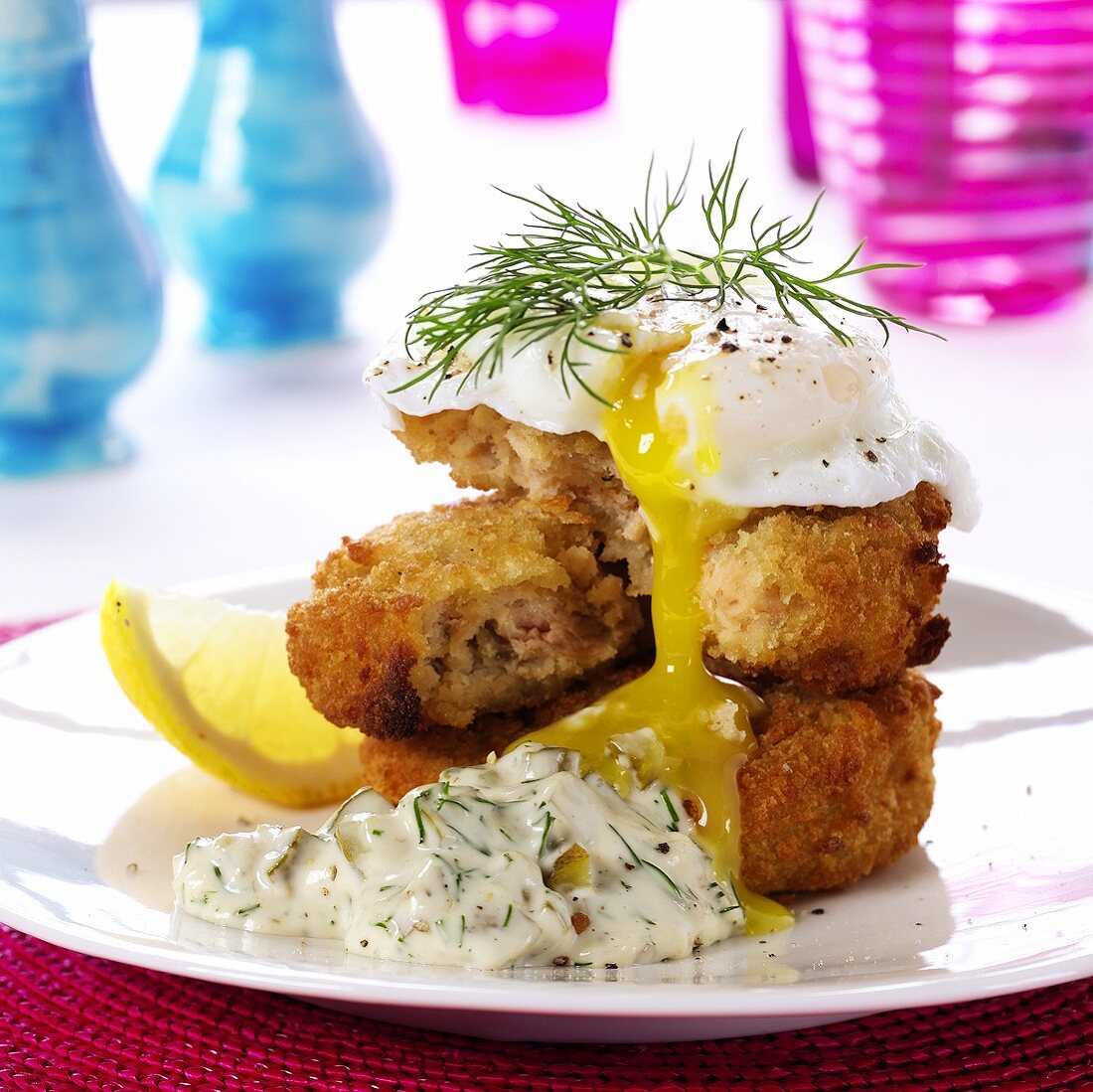 Fish cakes with poached egg and remoulade sauce