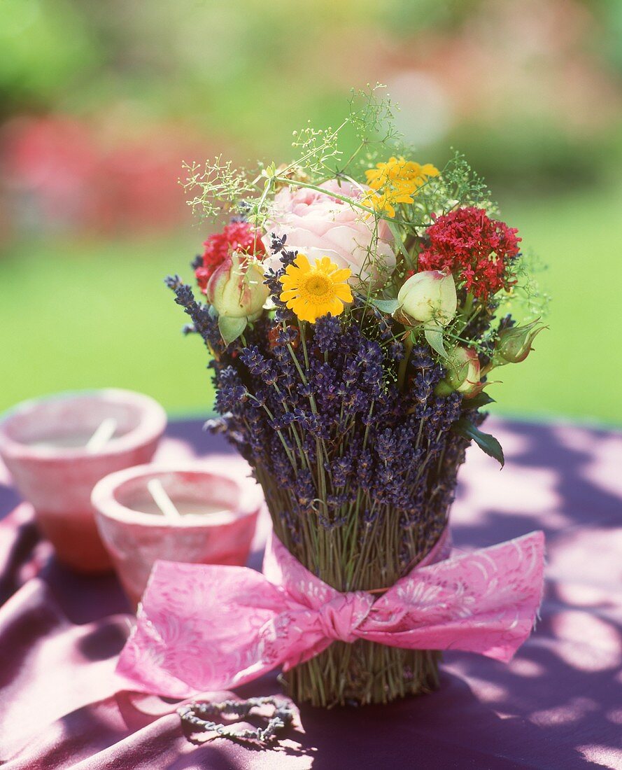 Bouquet of lavender and other flowers as table decoration