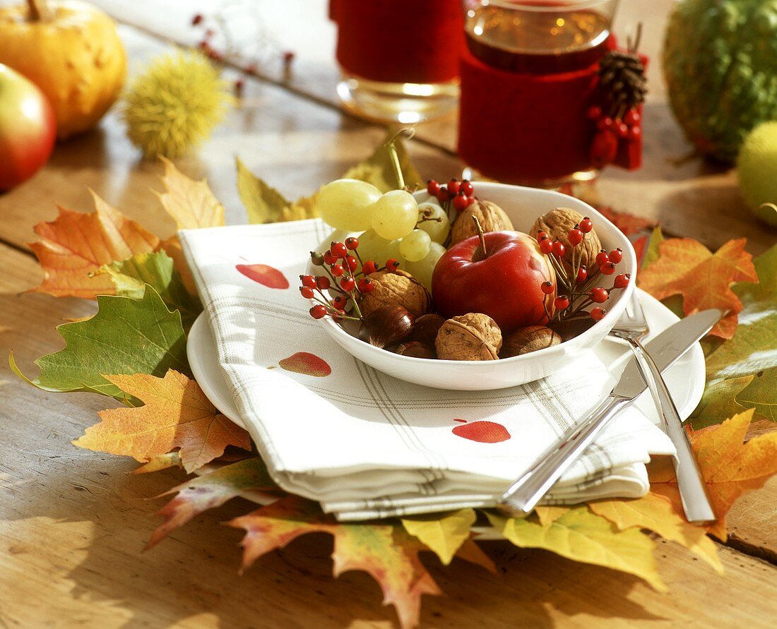 Autumnal fruit bowl on hand-printed linen cloths