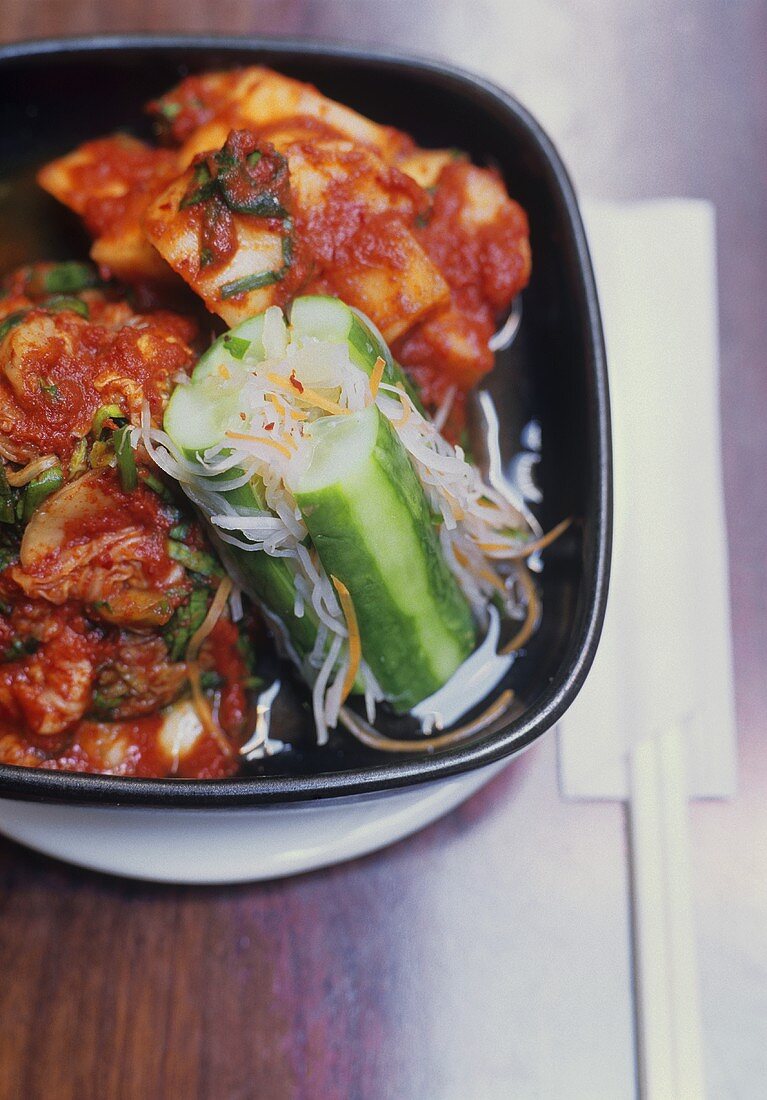 Korean kimchee with cucumber and cabbage (pickled)