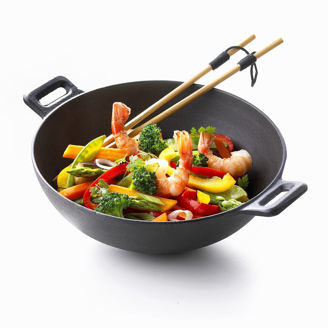 Wok with vegetables and shrimps, chopsticks