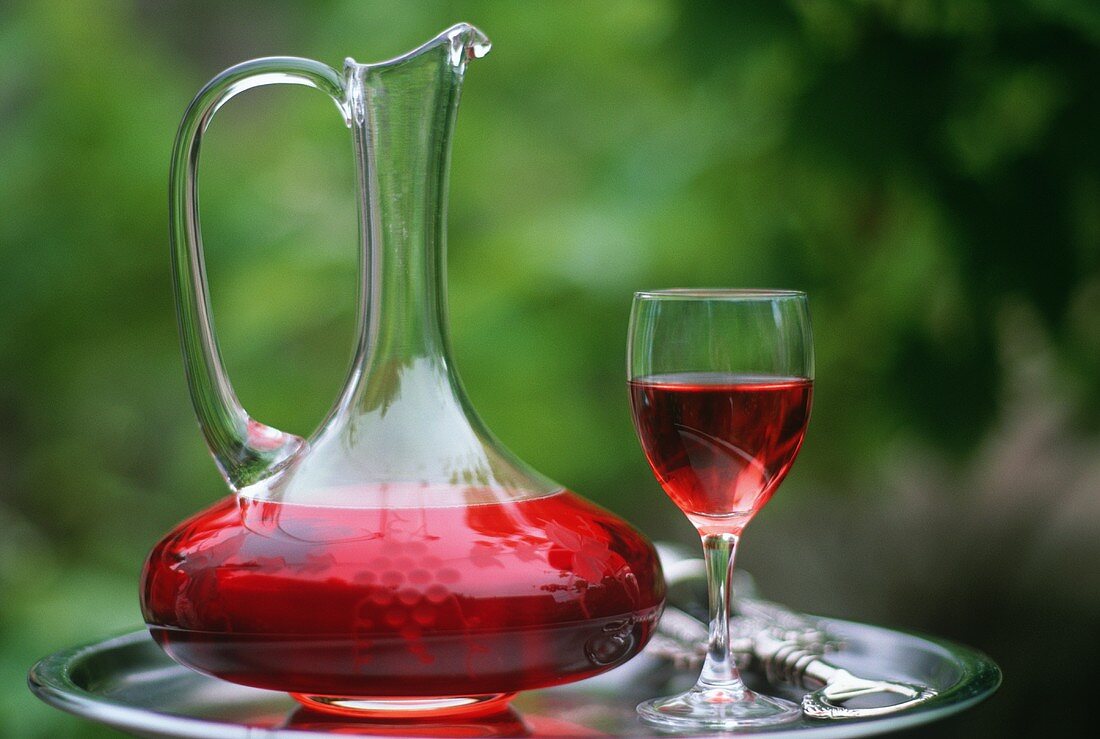 Rosé wine in glass and carafe (French vin de pays)