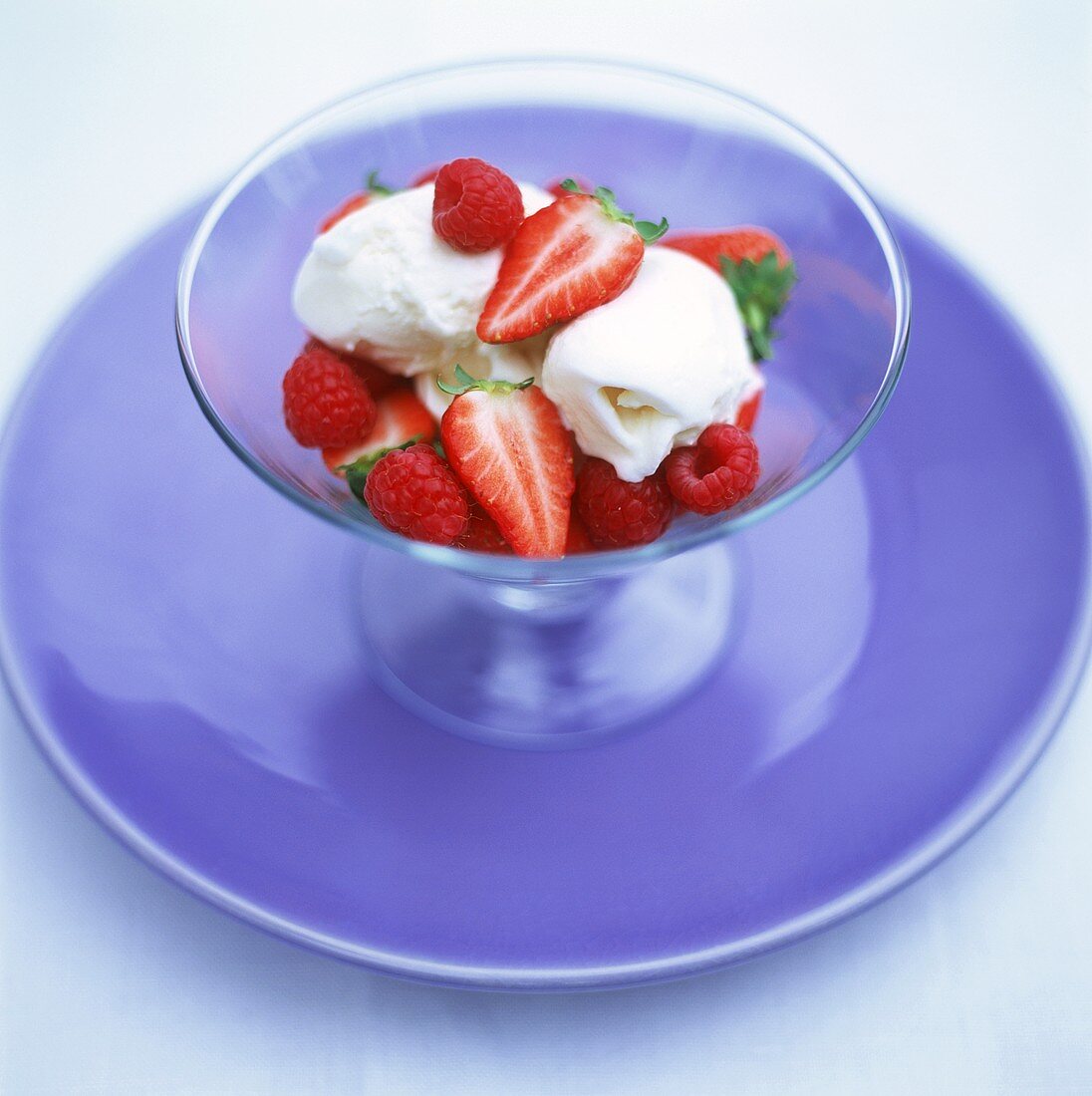 Vanilla ice cream with fresh strawberries & raspberries
