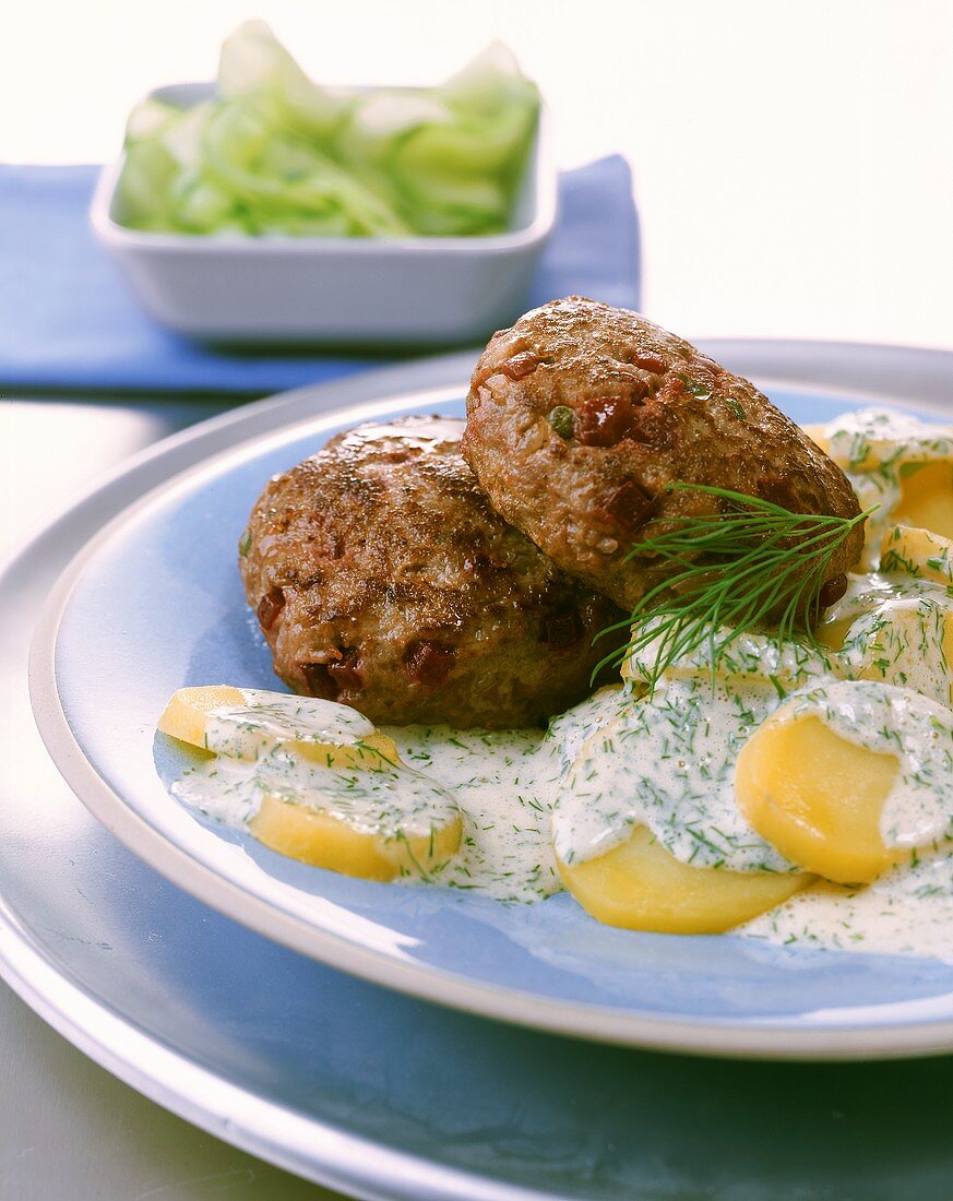Meatballs with beetroot, with creamed dill potatoes