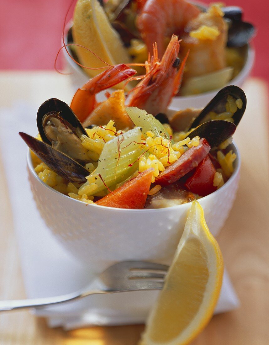 Paella served in white bowls