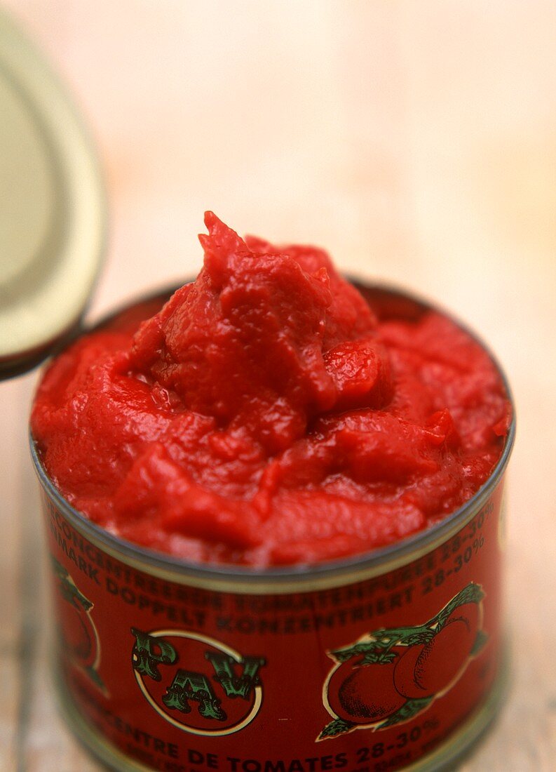 Opened tomato puree tin