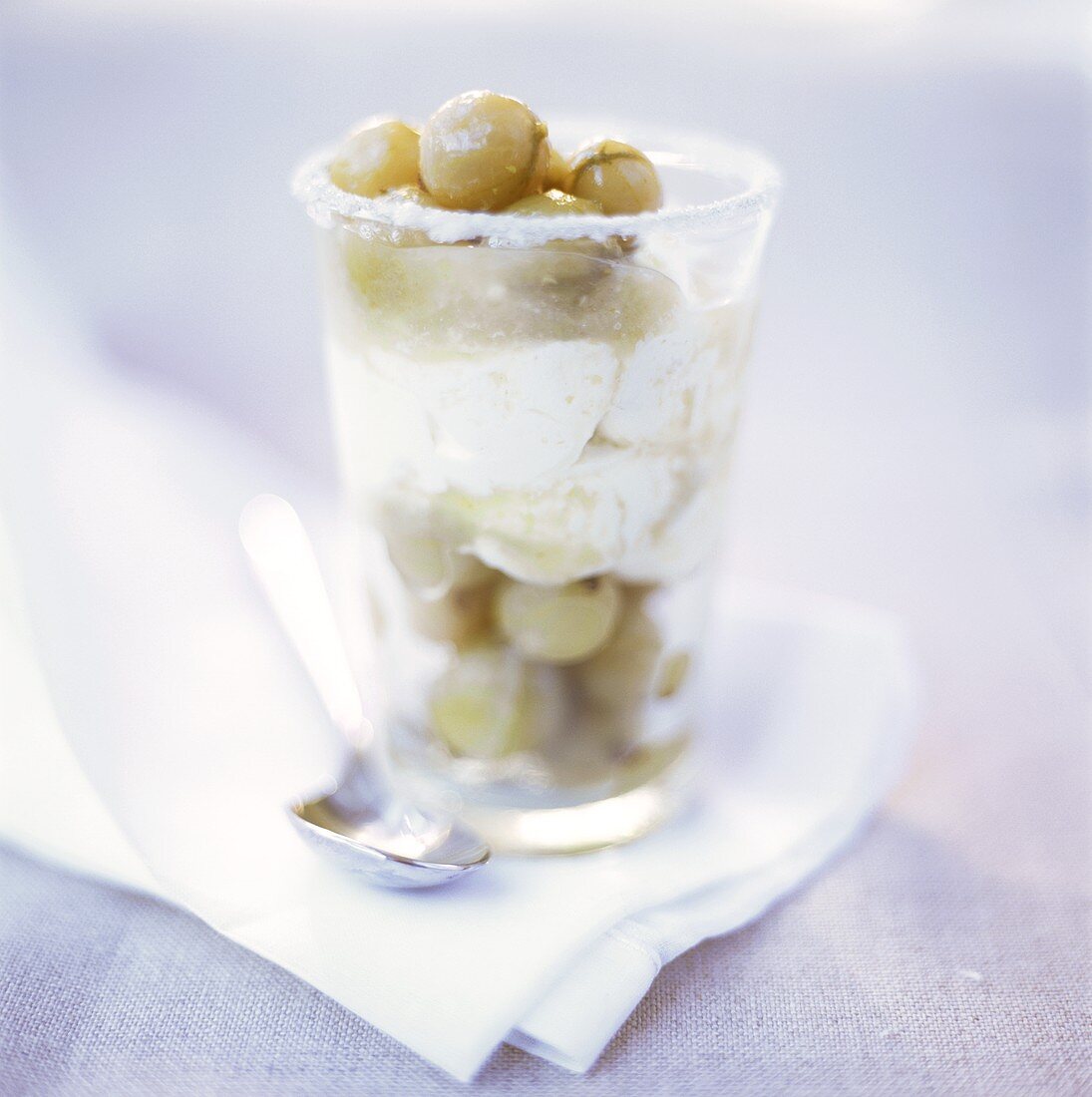 Layered sundae with yoghurt ice cream and gooseberry compote