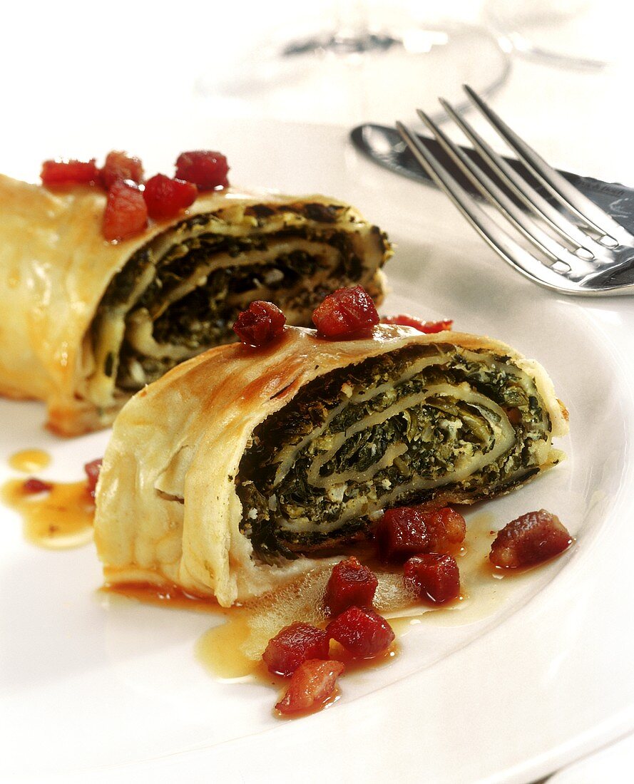 Savoury strudel with kale filling and diced bacon