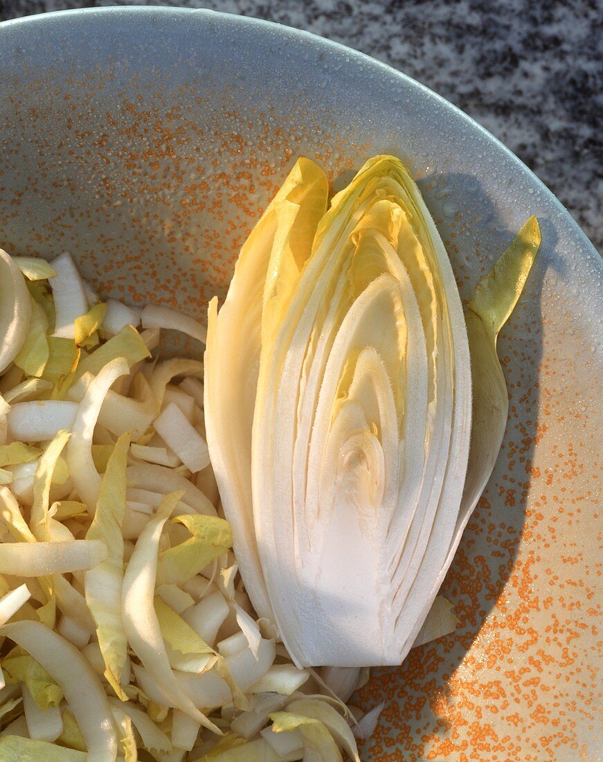 Chicory, one half and one cut open on a plate