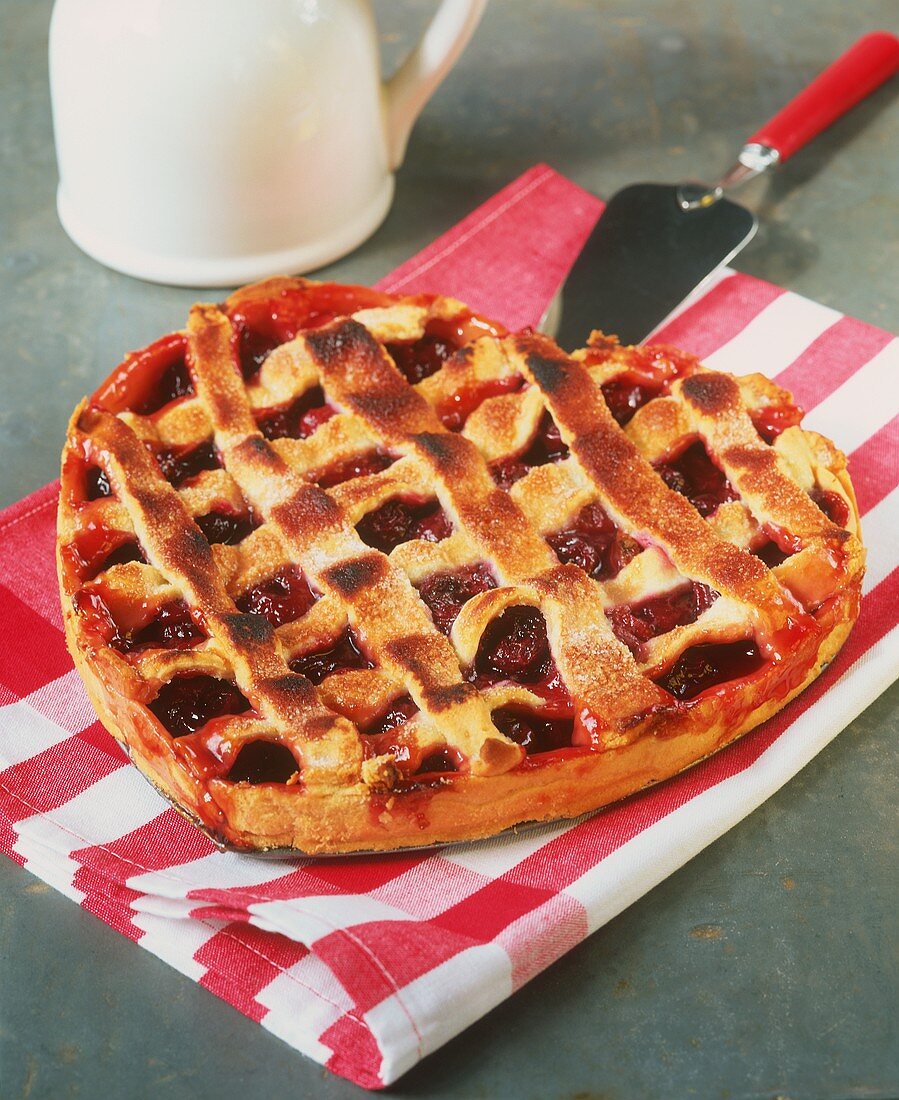 Heart-shaped cherry tart