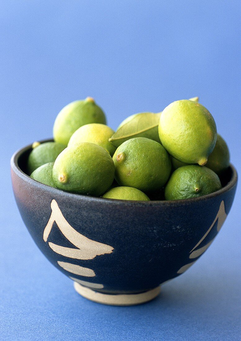 Limequats (mini-limes) in a bowl