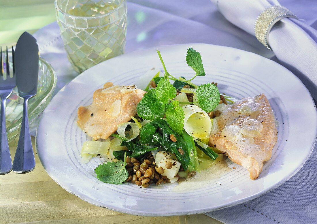 Salmon trout fillets with beer sauce and kohlrabi & lentils