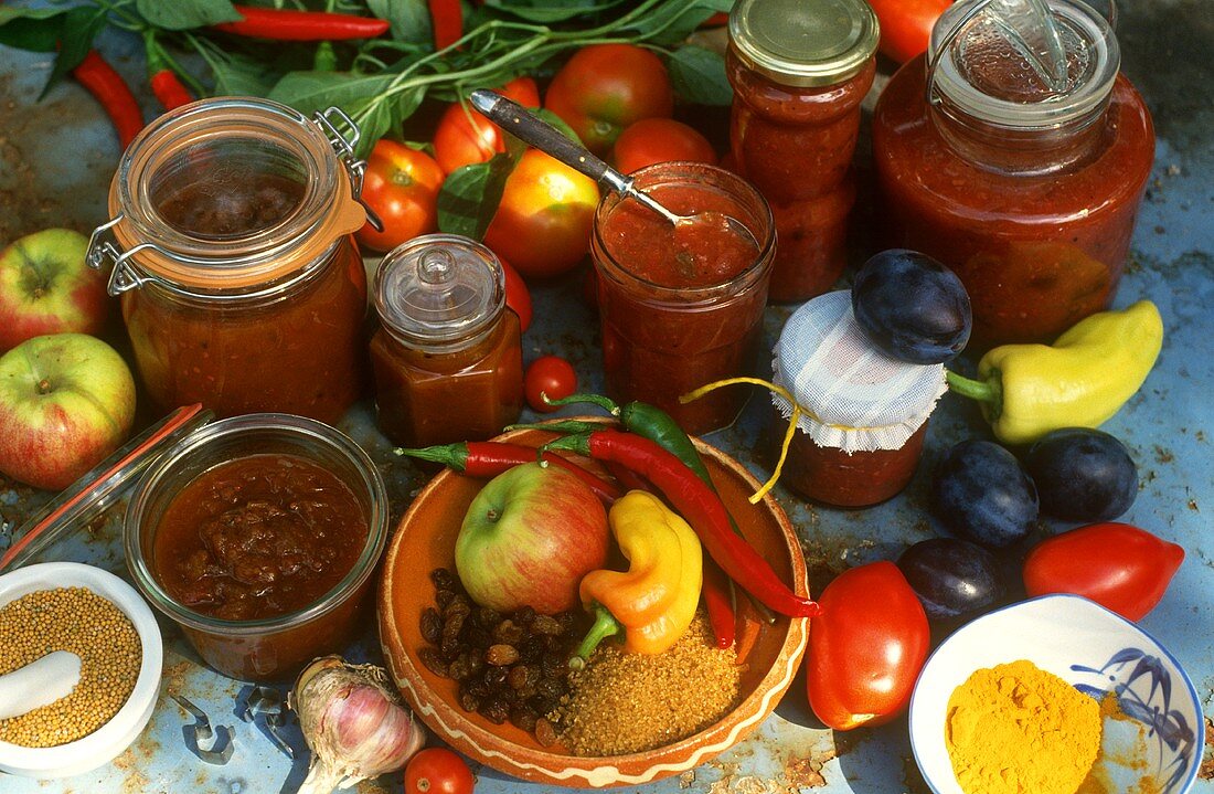 Tomato sauces and chutneys in jars; spices; ingredients