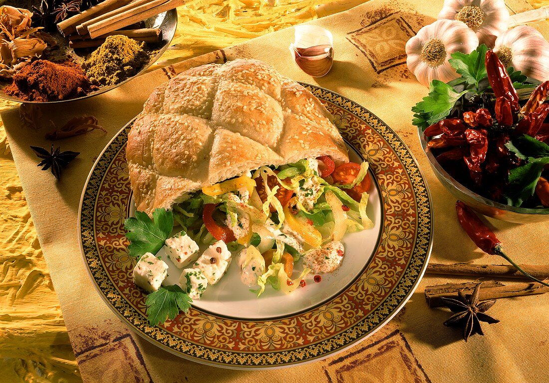 Filled pita bread with sheep's cheese and vegetables