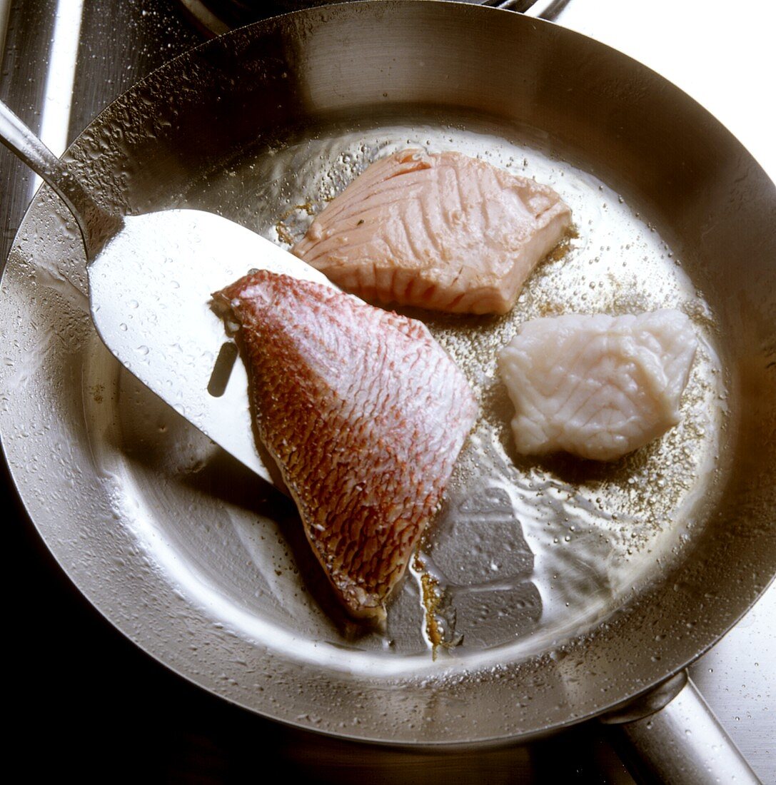Frying fish fillets in butter