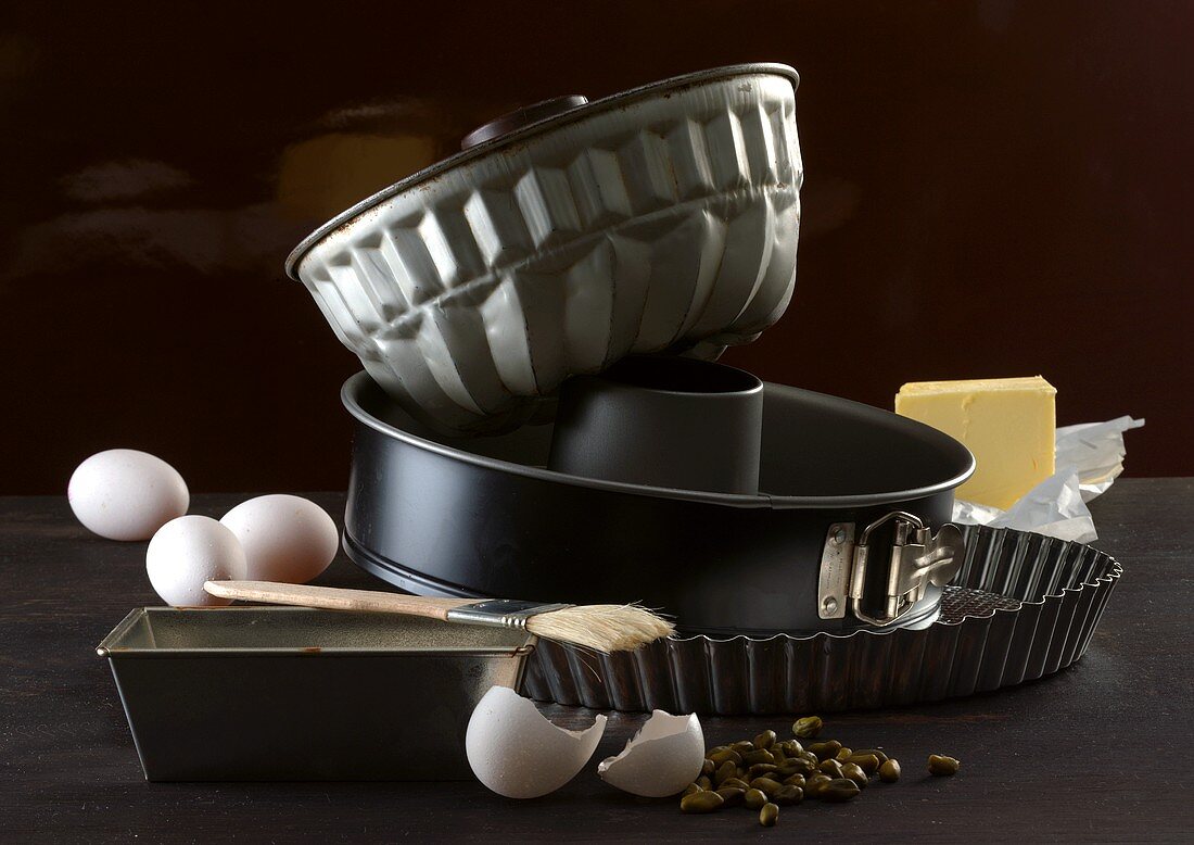 Still life with baking tins and baking ingredients