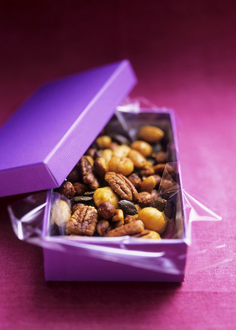 Roasted nuts with curry powder in gift box