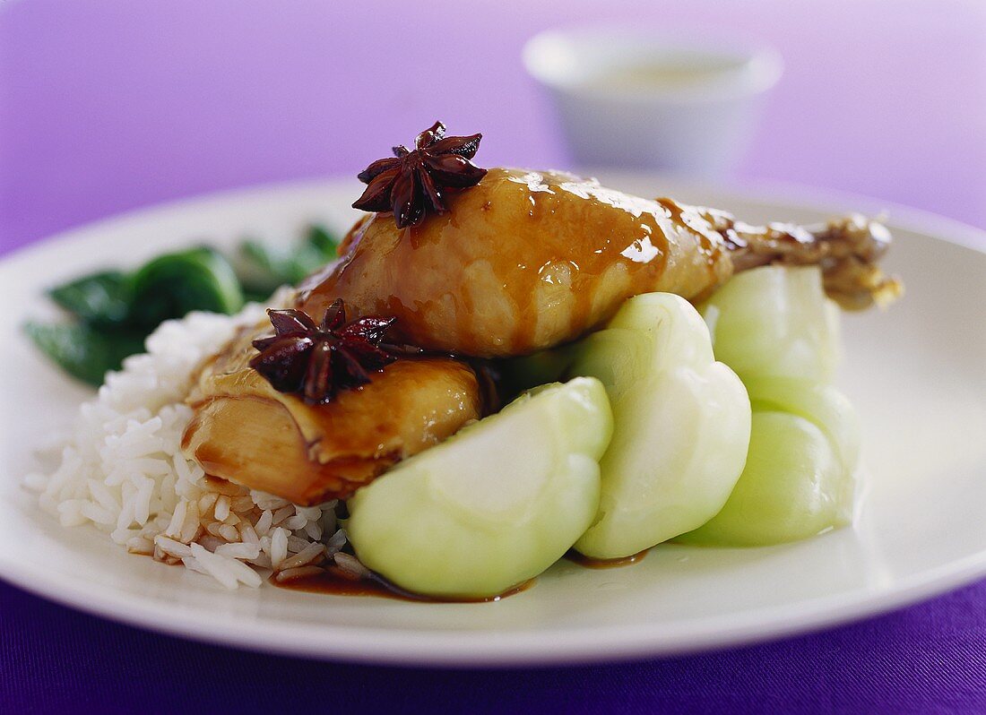 Chicken with star anise, soy sauce, pak choi and rice