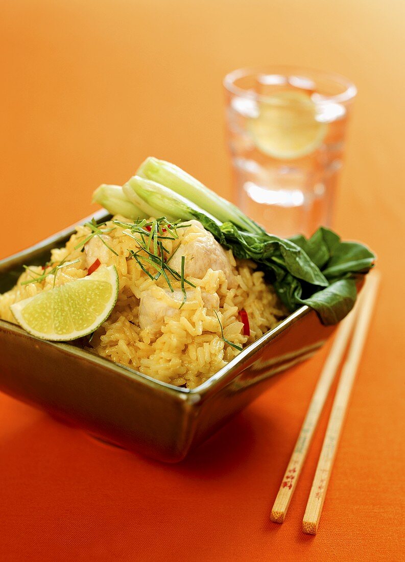 Curried rice with fish and pak choi