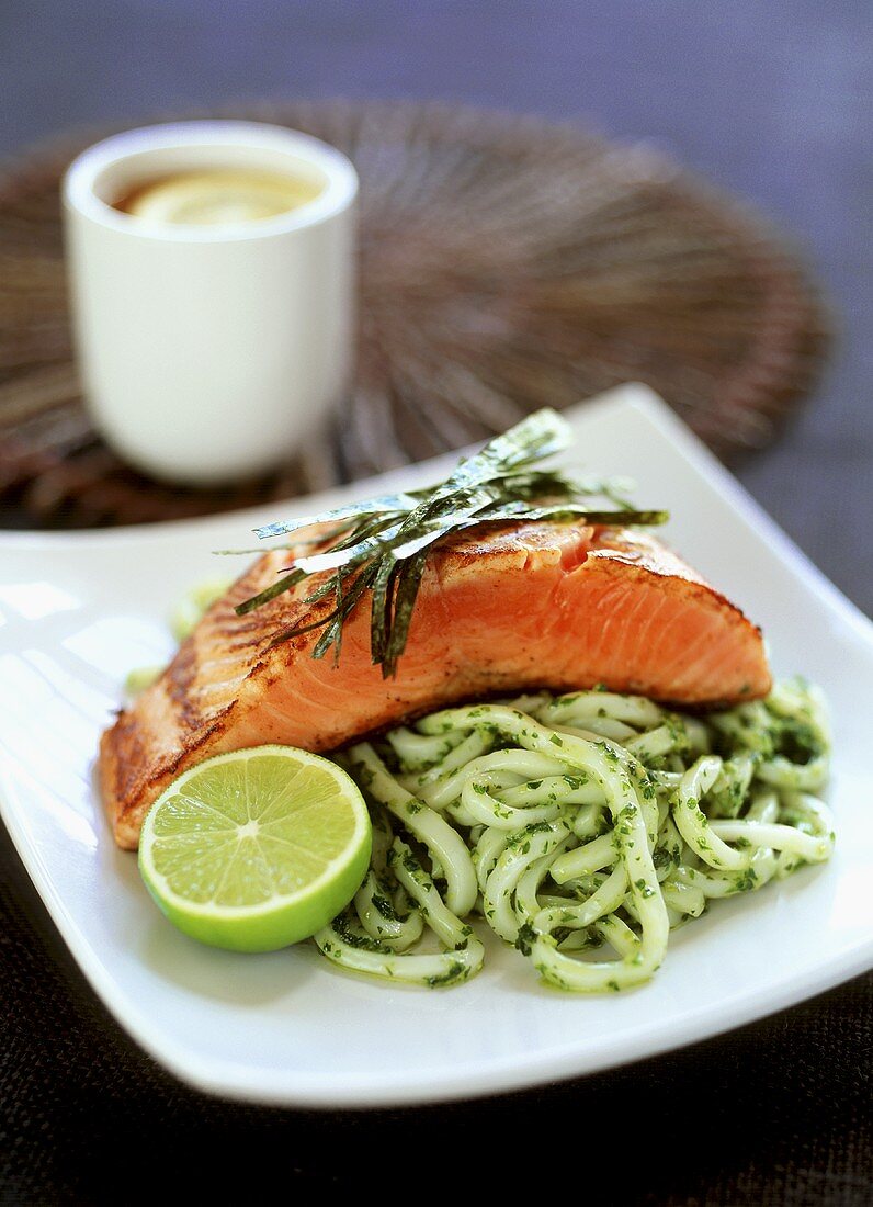 Salmon fillet on noodles with coriander