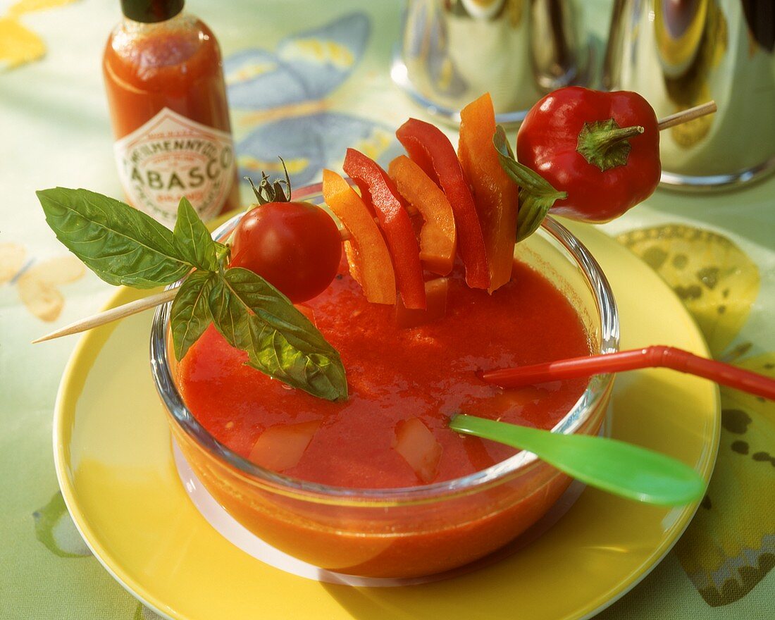 Cold tomato soup with pepper kebabs