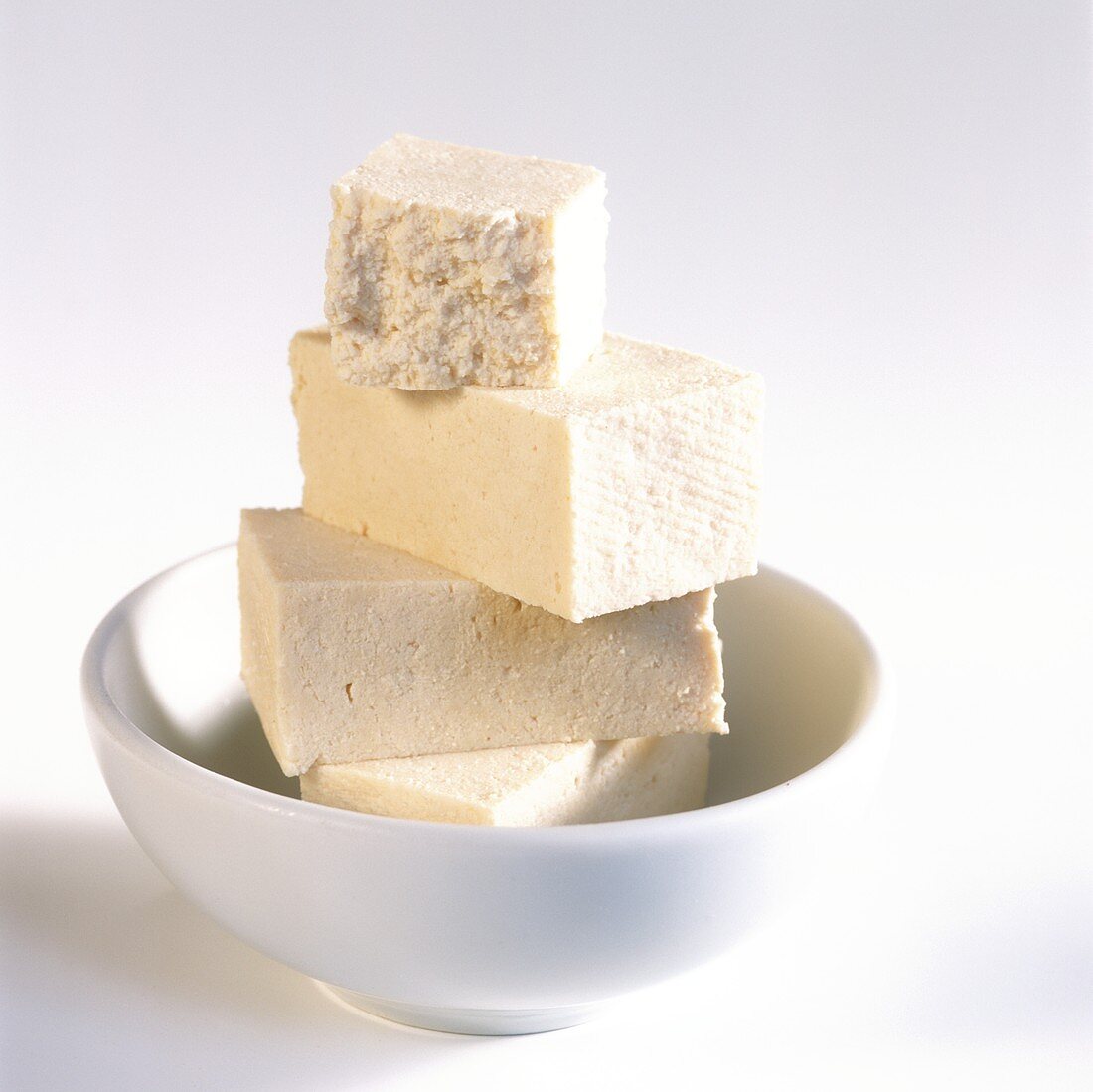 Slices of tofu in a bowl