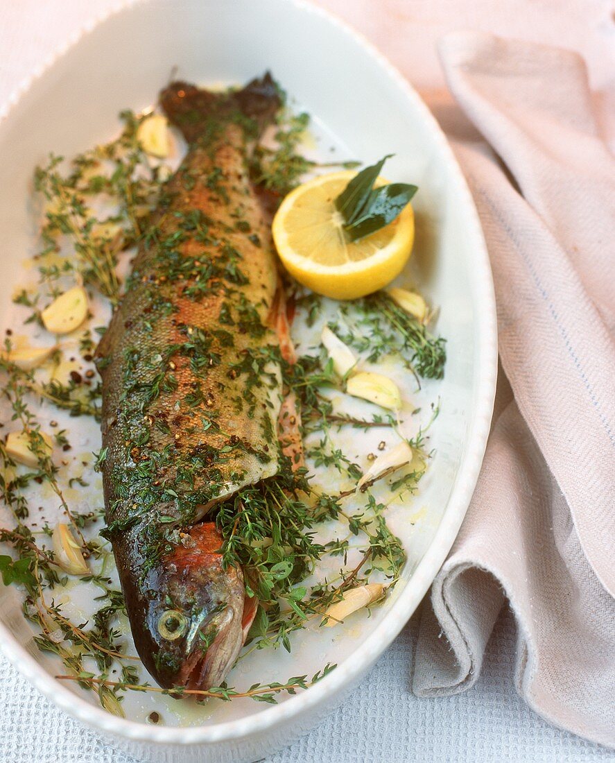 Raw trout with thyme, ready for the oven