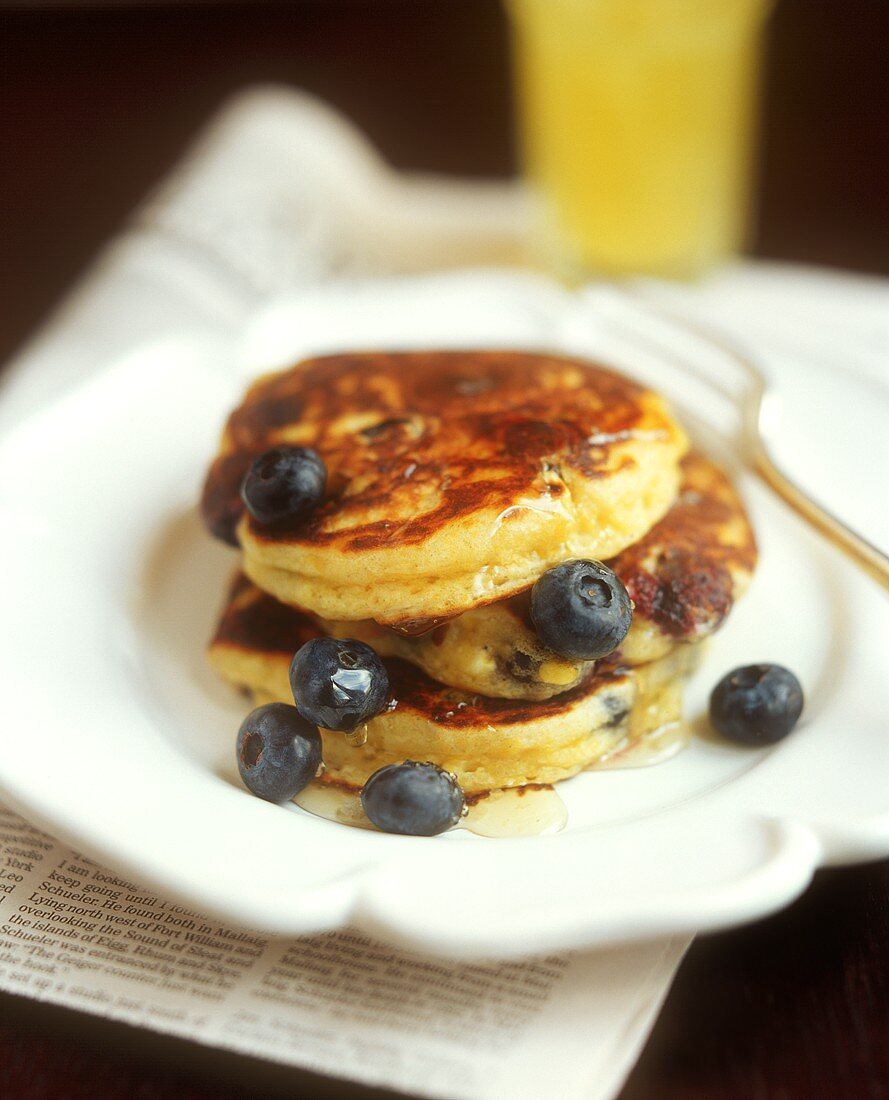 Pancake with blueberries and rosewater and honey syrup