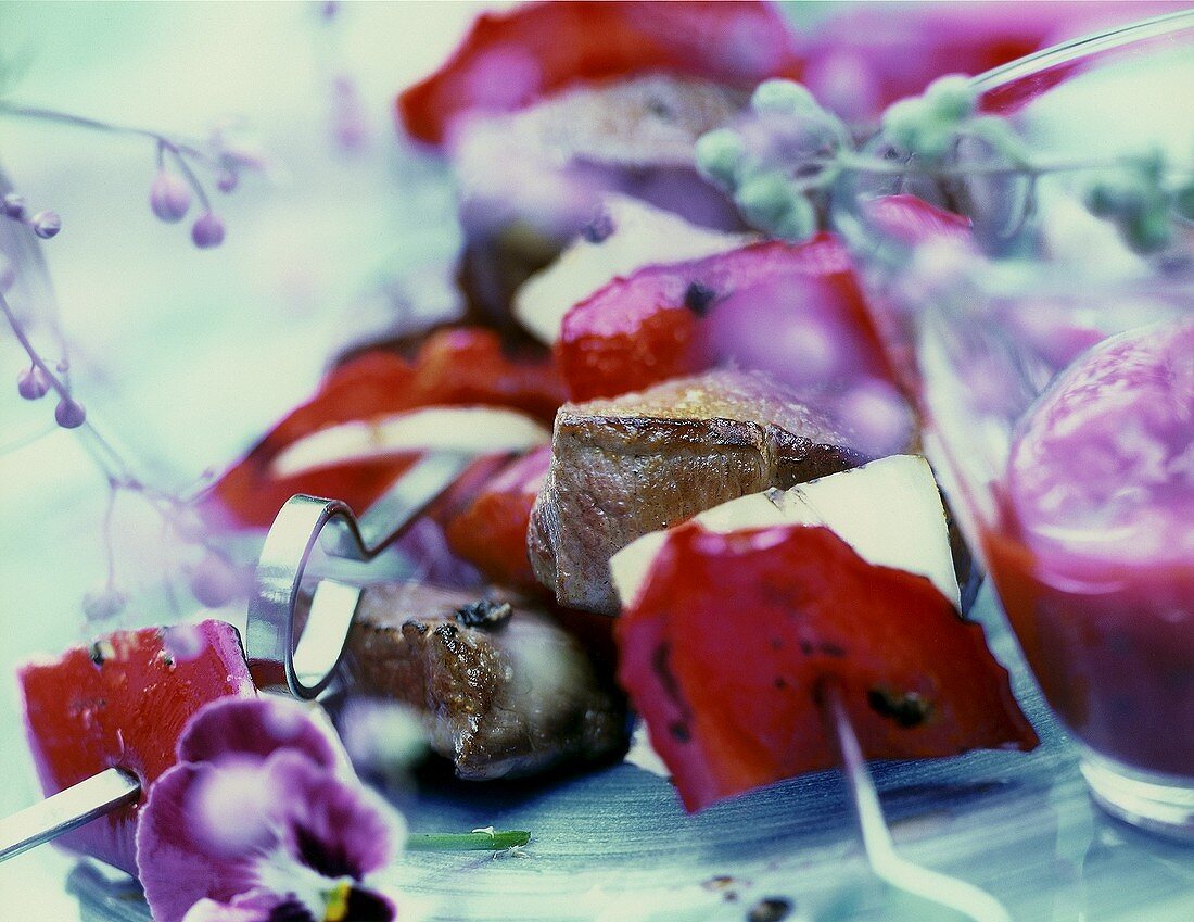 Meat and vegetable kebab with flowers