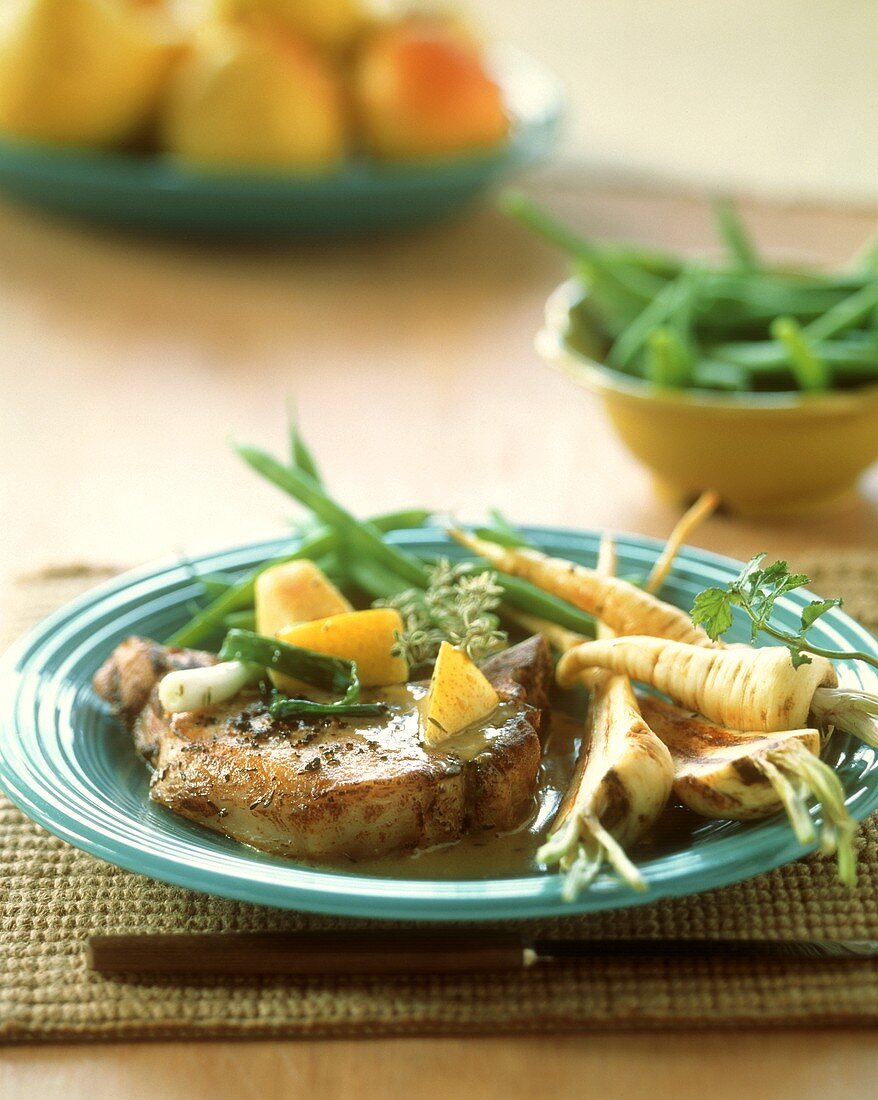 Pork chop with parsnips and pears