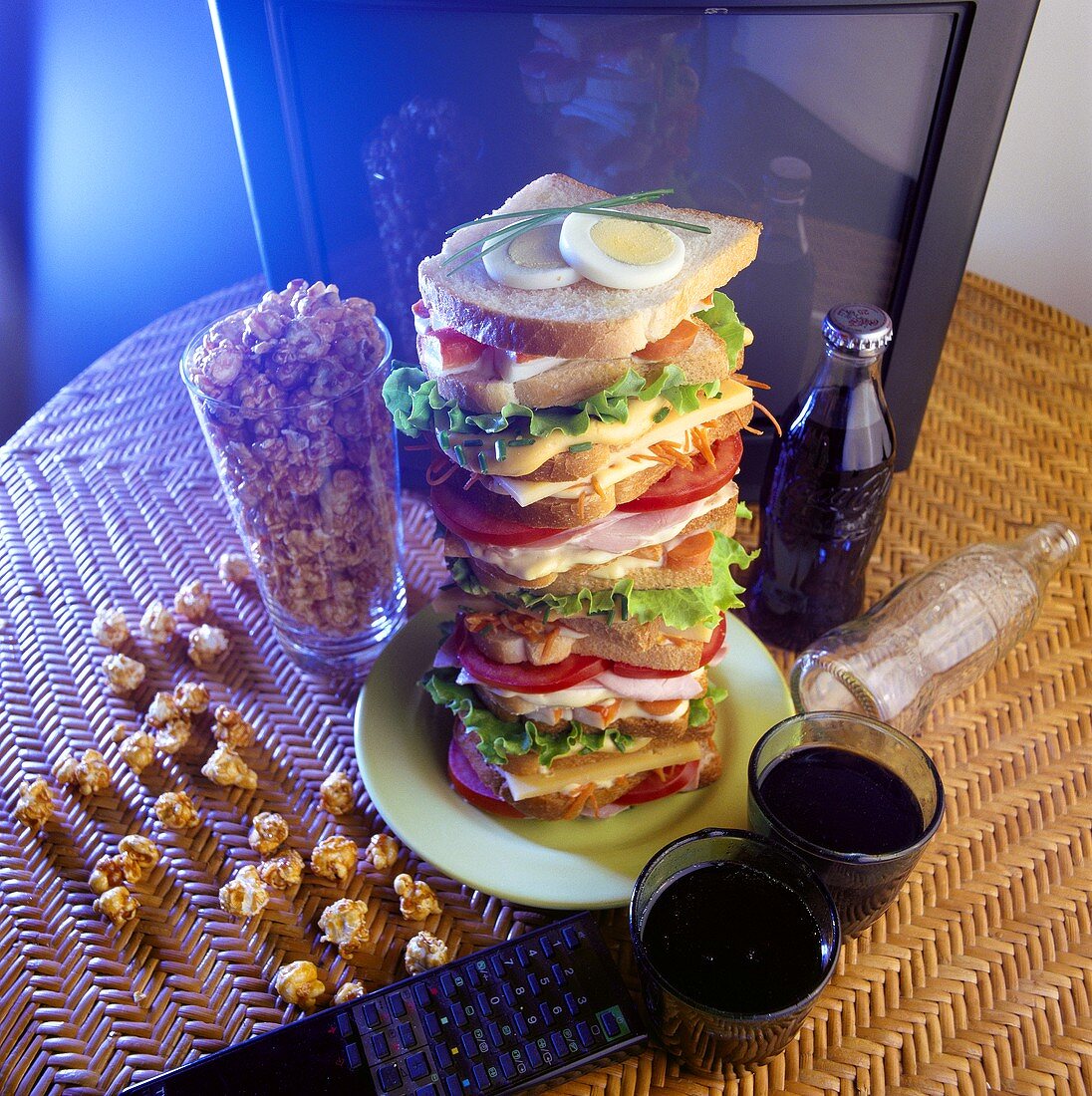 Tower of sandwiches, cola & popcorn